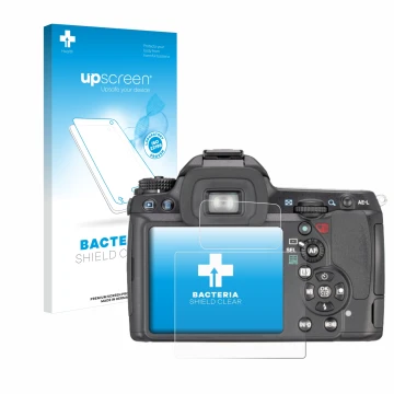 Parte frontale di una confezione del prodotto con il logo del marchio upscreen. Accanto è raffigurato il dispositivo Pentax K7