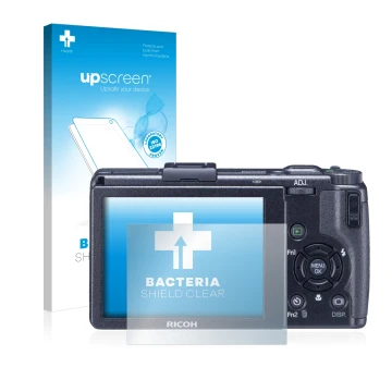 Parte frontale di una confezione del prodotto con il logo del marchio upscreen. Accanto è raffigurato il dispositivo Ricoh GR 