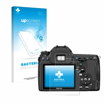 Parte frontale di una confezione del prodotto con il logo del marchio upscreen. Accanto è raffigurato il dispositivo Pentax K5